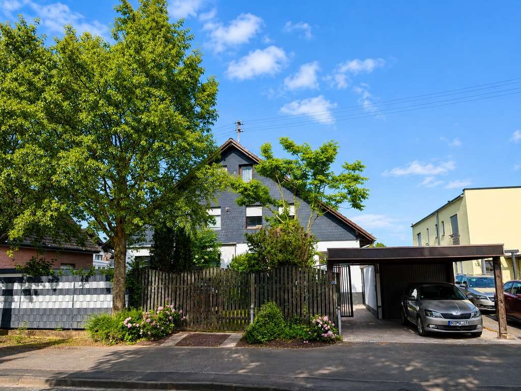 Immobilie in Rheinbach - Familienfreundliche Doppelhaushälfte  mit großem Garten, PV-Anlage und Wärmepumpe - Bild 1
