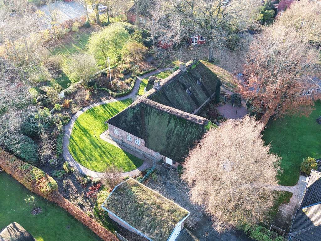 Immobilie in Risum-Lindholm - Reetdachkate mit historischem Flair & Gartenidylle vereint - Bild 4