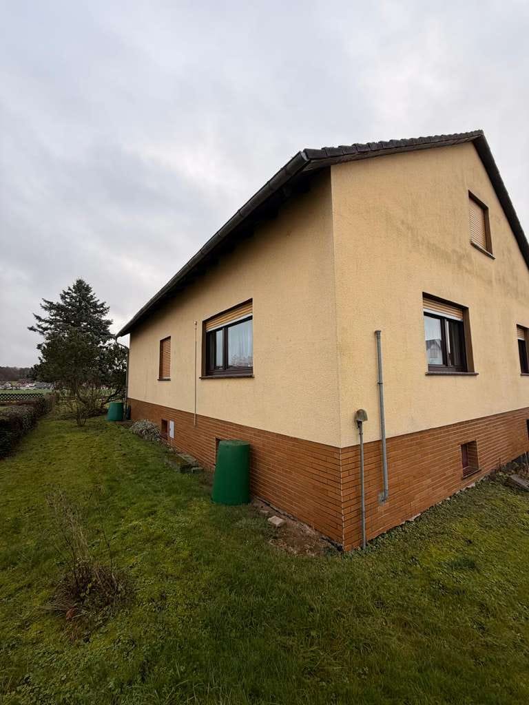 Immobilie in Kirchhain - Raumtraum in ländlicher Idylle. Einfamilienhaus mit Ausbaureserve - Bild 0