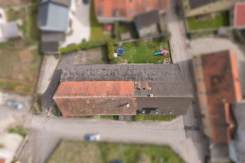 Immobilie in Schlüsselfeld - Zweifamilienhaus mit Scheune, Garten und vielseitigem Nutzungspotenzial - Bild 2