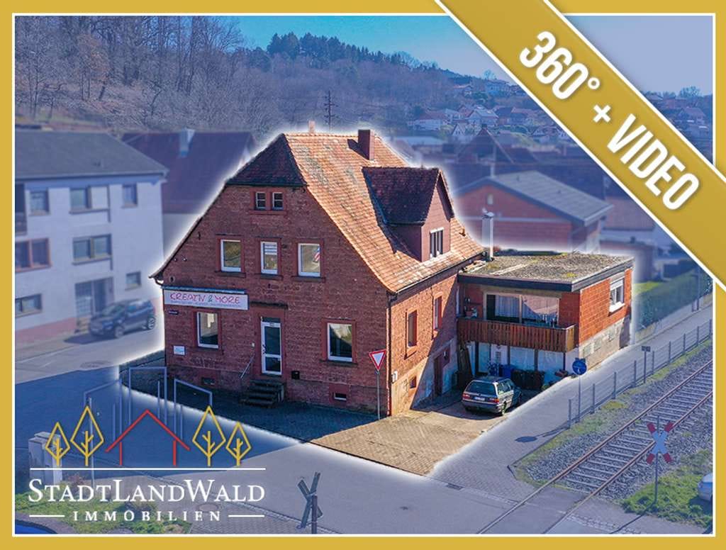 Immobilie in Bruchweiler-Bärenbach - Großes Mehrfamilienhaus mit 2 Wohnungen, 2 Gewerbeeinheiten und Entwicklungspotenzial - Bild 0