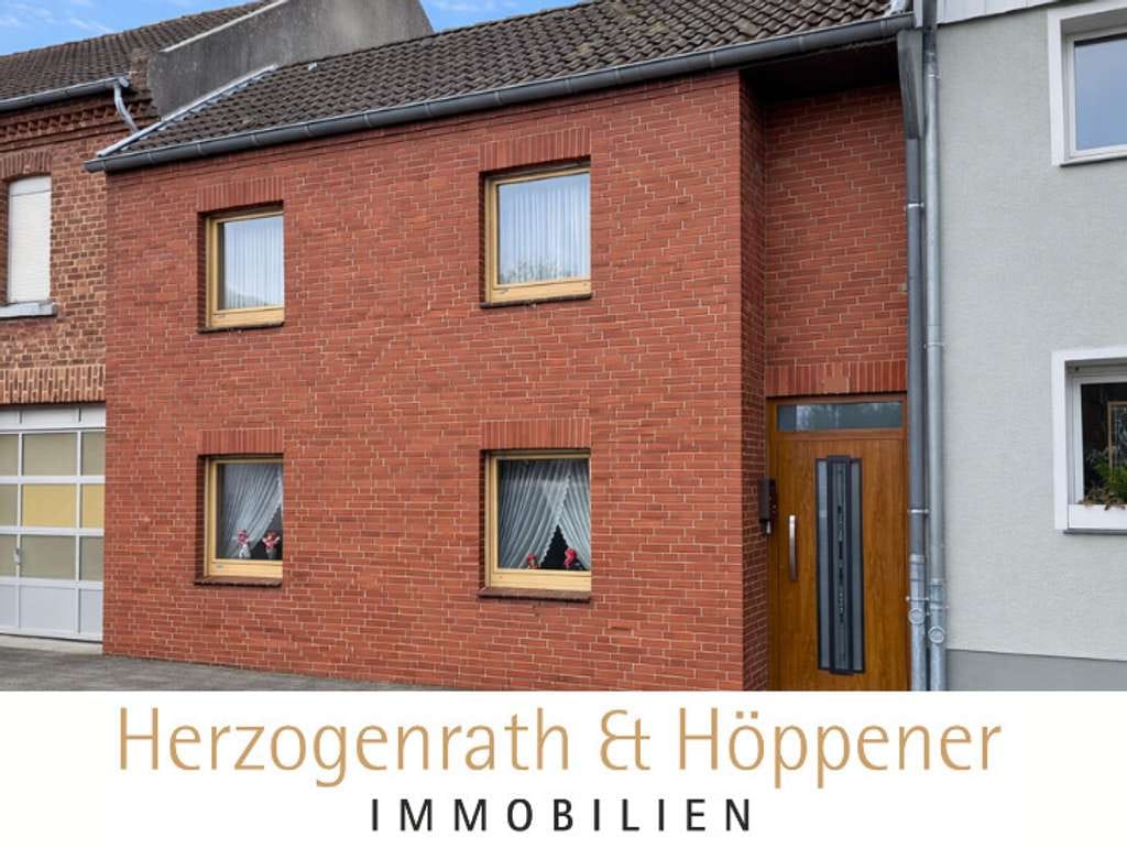 Immobilie in Niederzier - Einfamilienhaus mit großzügigem Westgrundstück und separatem Garagenareal - Bild 0