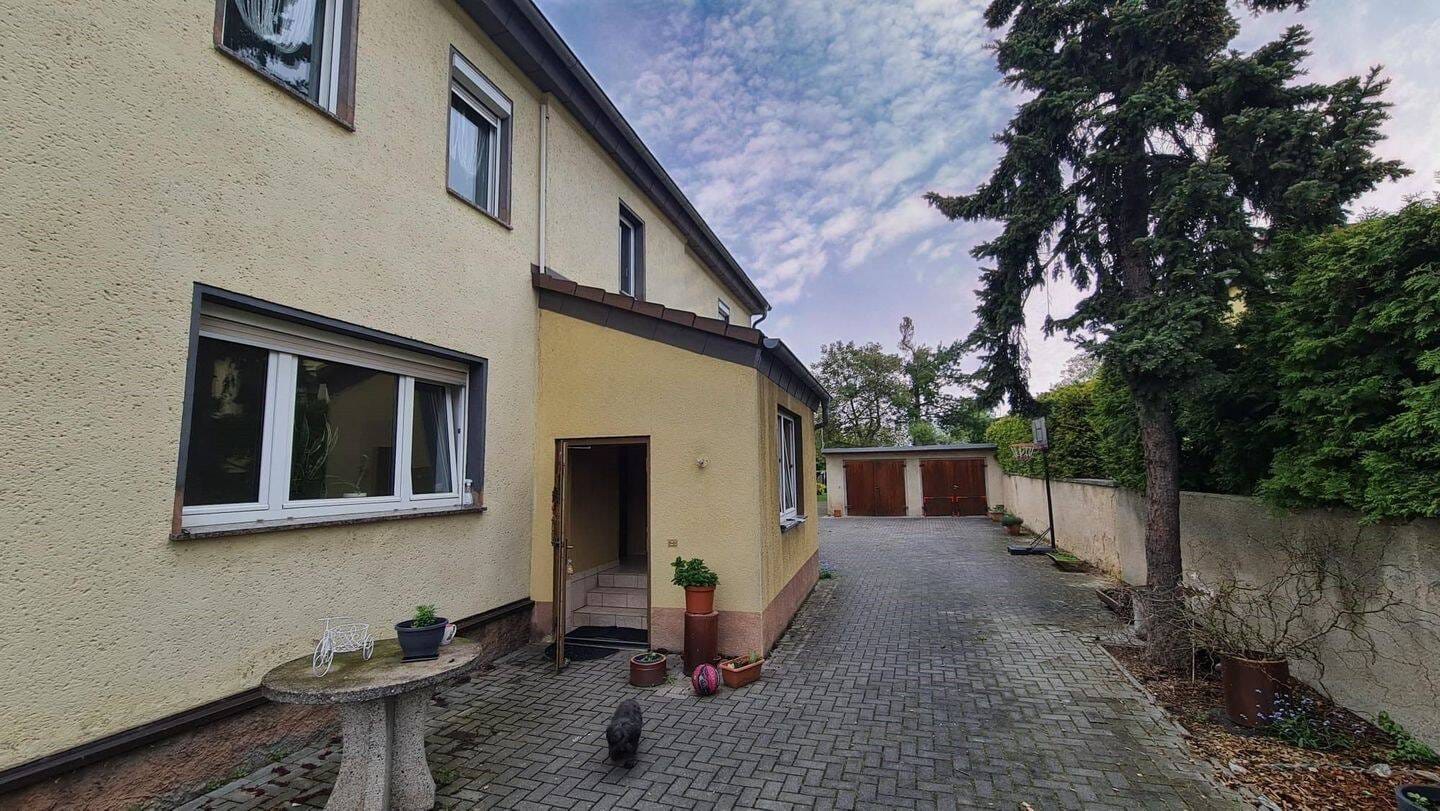 Immobilie in Schkeuditz - Einfamilienhaus mit zwei separaten Wohneinheiten, großem Garten und Sommer-Gartenhäuschen - Bild 4