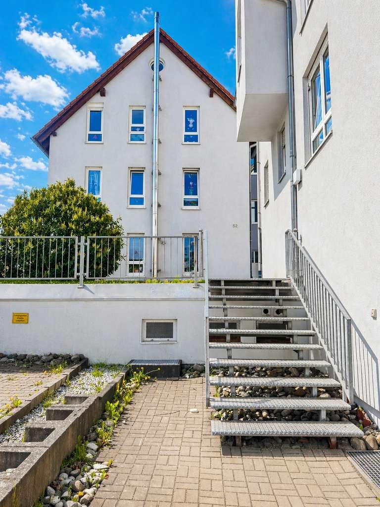 Immobilie in Gaildorf - Wohnen mit Flair: Dachgeschoss-Maisonette mit Holztreppe, Balkon und Ausblick über Gaildorf - Bild 3