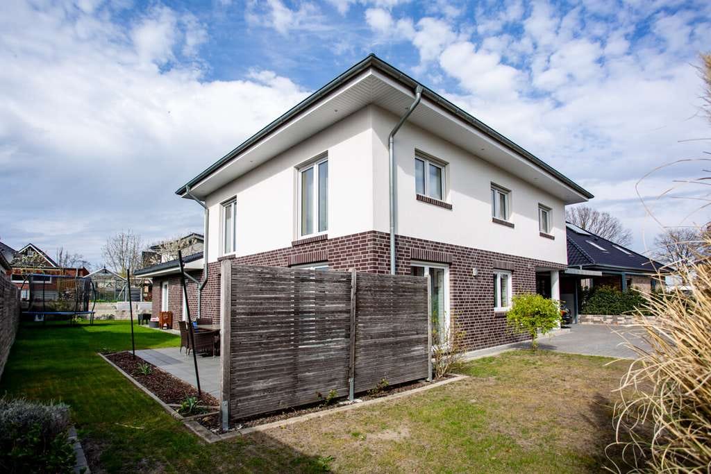 Immobilie in Bohmte - Exklusives Einfamilienhaus mit Einliegerwohnung in familienfreundlicher Lage von Bohmte! - Bild 1