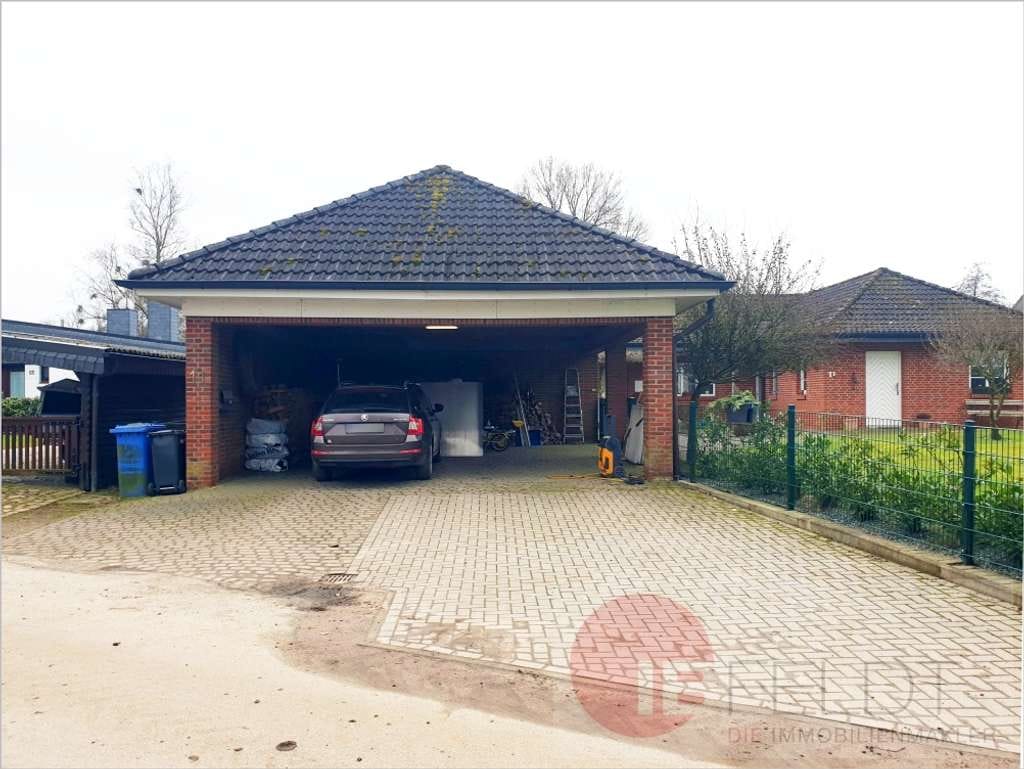 Immobilie in Kattendorf - Idyll am Rande Hamburgs: Ebenes Wohnhaus mit wertiger Ausstattung, Carport + Garten mit Ausblick - Bild 2