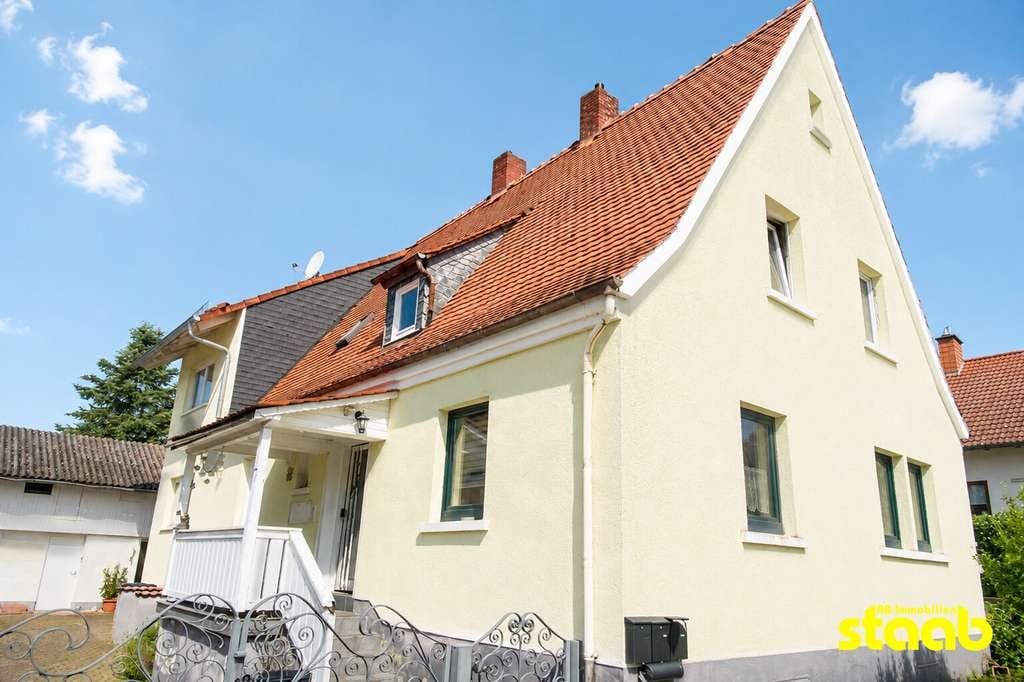 Immobilie in Sulzbach am Main - Wohnen mit Perspektive – Siedlungshaus mit Nebengebäude und Grundstück - Bild 0
