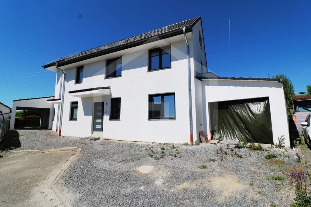 Immobilie in Helmstadt-Bargen - Luxus trifft Design – exklusiver Erstbezug im Neubau - Bild 1