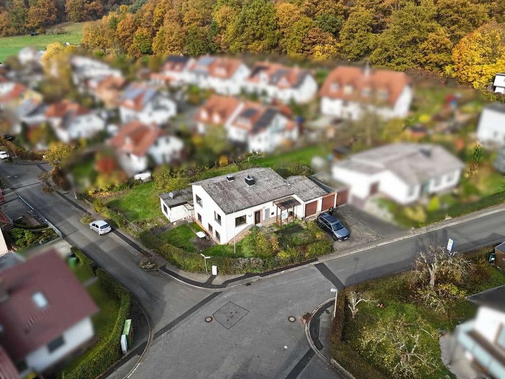 Immobilie in Cölbe - Zwei Wohneinheiten unter einem Dach in beliebter Wohnlage von Cölbe - Bild 1
