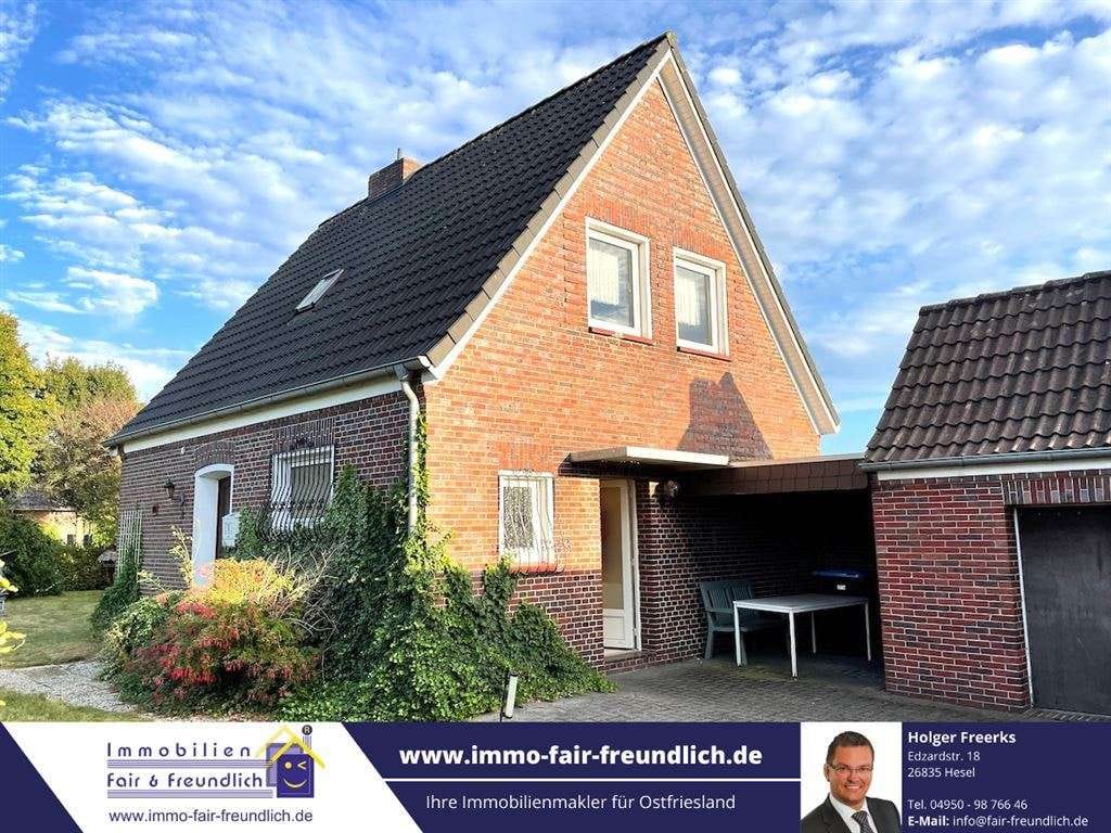 Immobilie in Hesel - *** GEPFLEGTES EINFAMILIENHAUS MIT CARPORT IN RUHIGER LAGE VON HOLTLAND NÜCKE!  - Bild 0