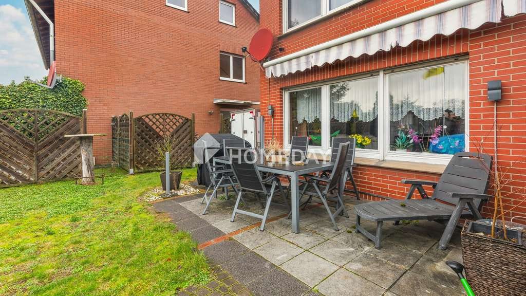 Immobilie in Ladbergen - Wohnen und Vermieten kombinieren: Drei-Parteien-Haus mit Garten, PV-Anlage & stabilen Mieteinnahmen - Bild 1