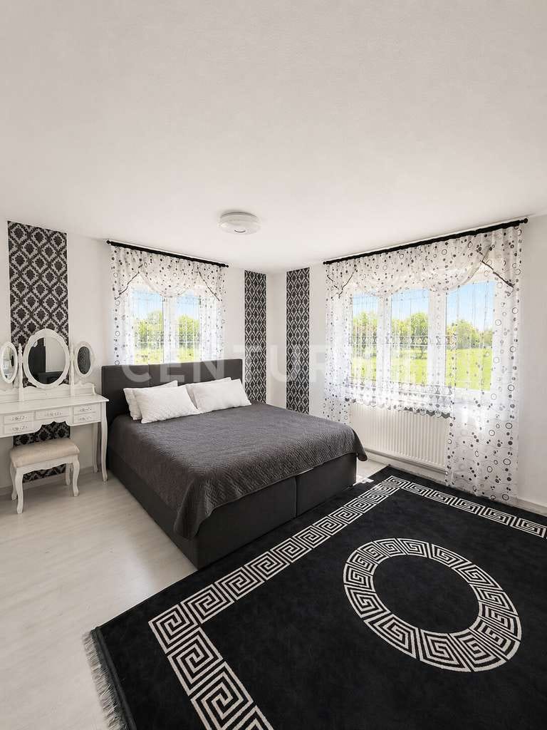 Immobilie in Ummendorf - Gepflegte 3-Zimmer-EG-Wohnung mit Terrasse & 432 m² Gartenanteil in Ummendorf - Bild 1
