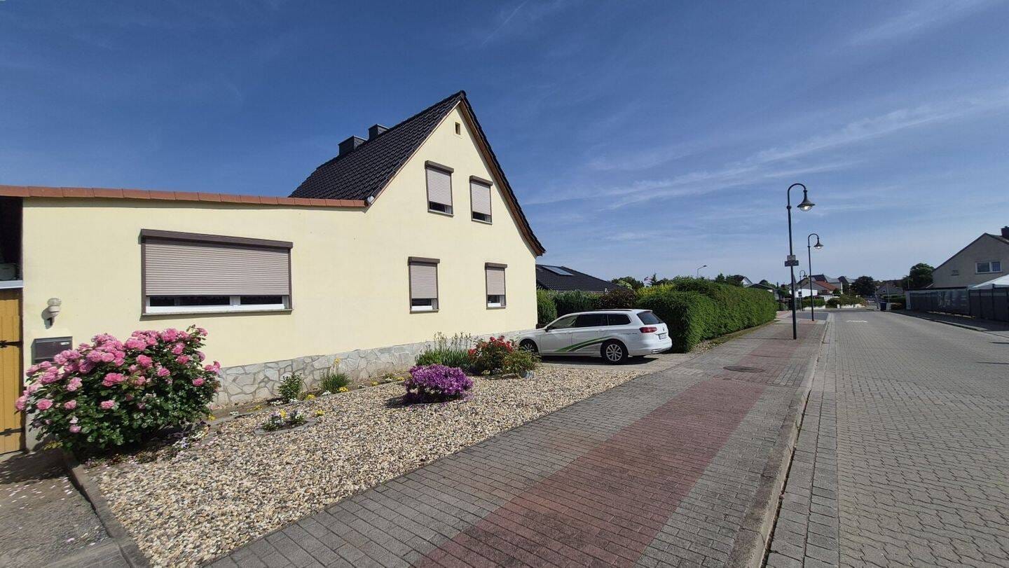 Immobilie in Barleben - Einfamilienhaus mit Nebengelass und Garage in Barleben - Bild 1