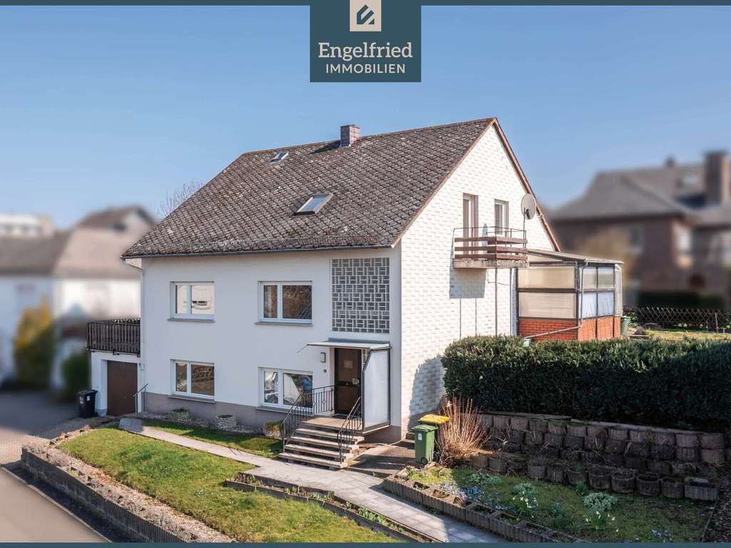 Immobilie in Altweidelbach - Großzügiges Ein- bis Zweifamilienhaus mit Garage und gemütlichem Wintergarten - Bild 0