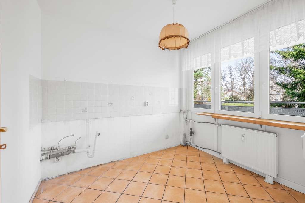 Immobilie in Unterhaching - Komfortable 2-Zimmer-Erdgeschosswohnung mit großer Loggia im beliebten Unterhaching!
 - Bild 2