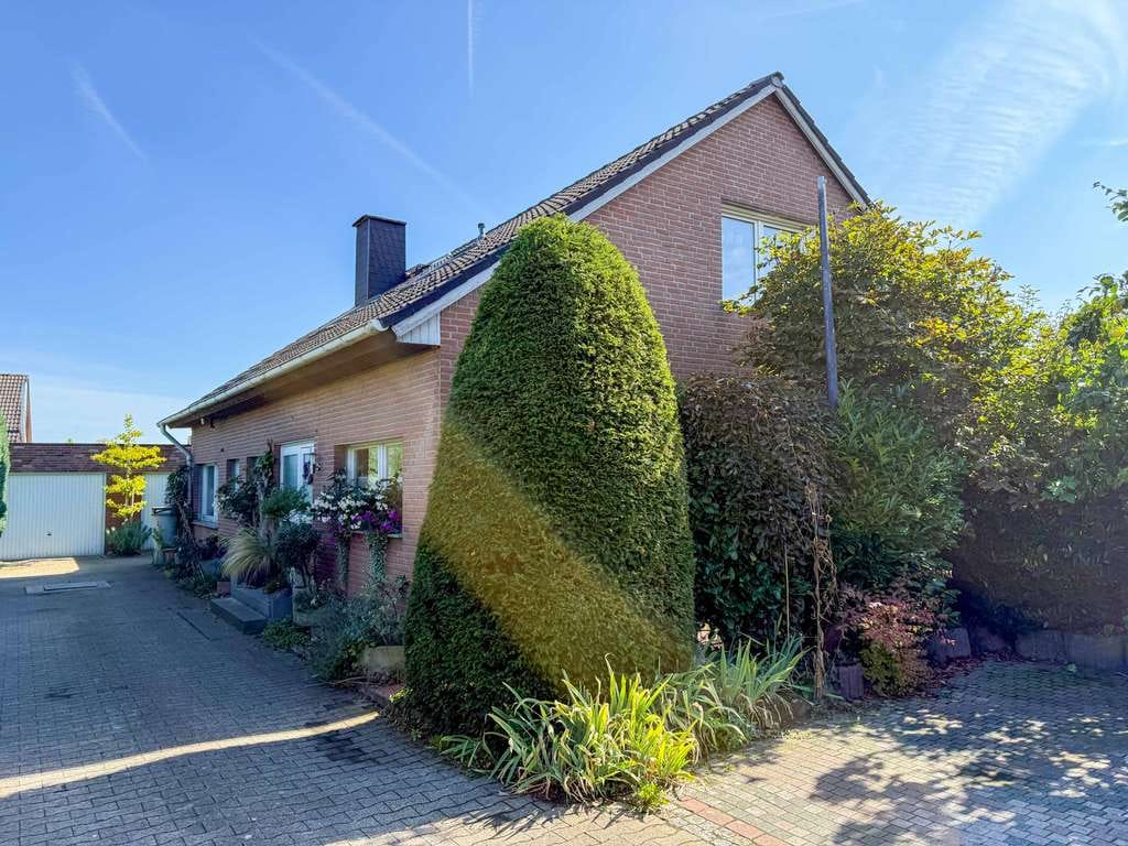 Immobilie in Everswinkel - Freistehendes Einfamilienhaus mit Raum für Handwerk, Hobby und Familie - Bild 0