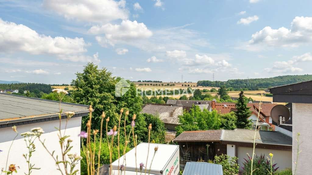 Immobilie in Hünstetten - Attraktives Zweifamilienhaus mit Vermietungs- und Eigennutzungsmöglichkeiten - Bild 3