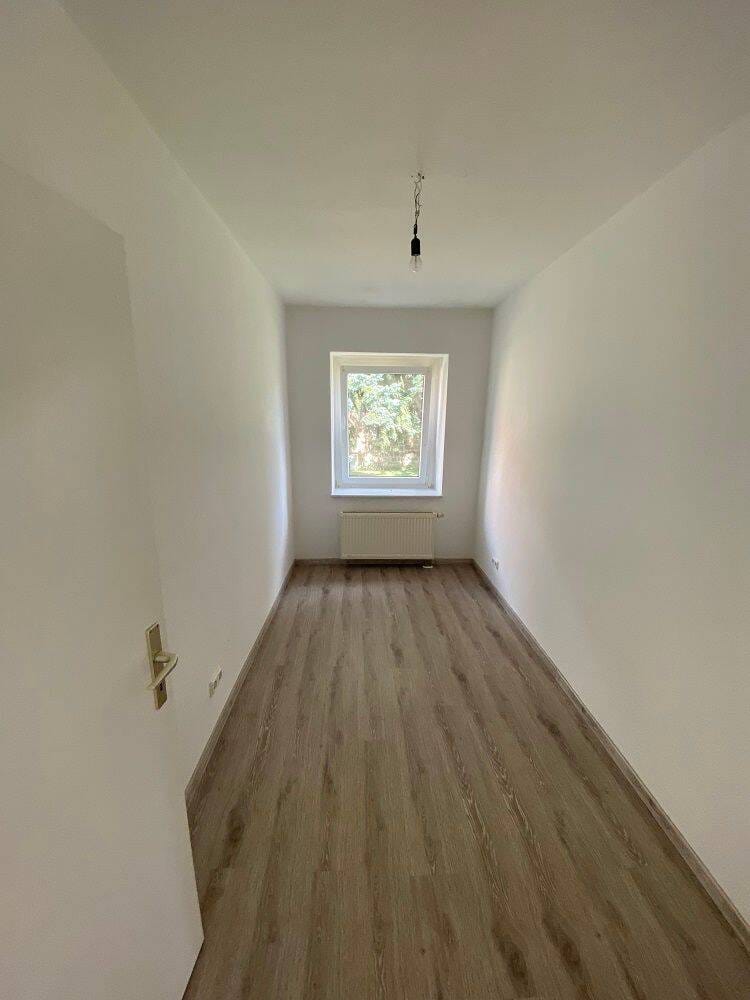 Immobilie in Querfurt - Voll vermietetes Mehrfamilienhaus mit 4 Wohnungen,  Grundstück und Stellplätzen in Querfurt OT Spielberg - Bild 5