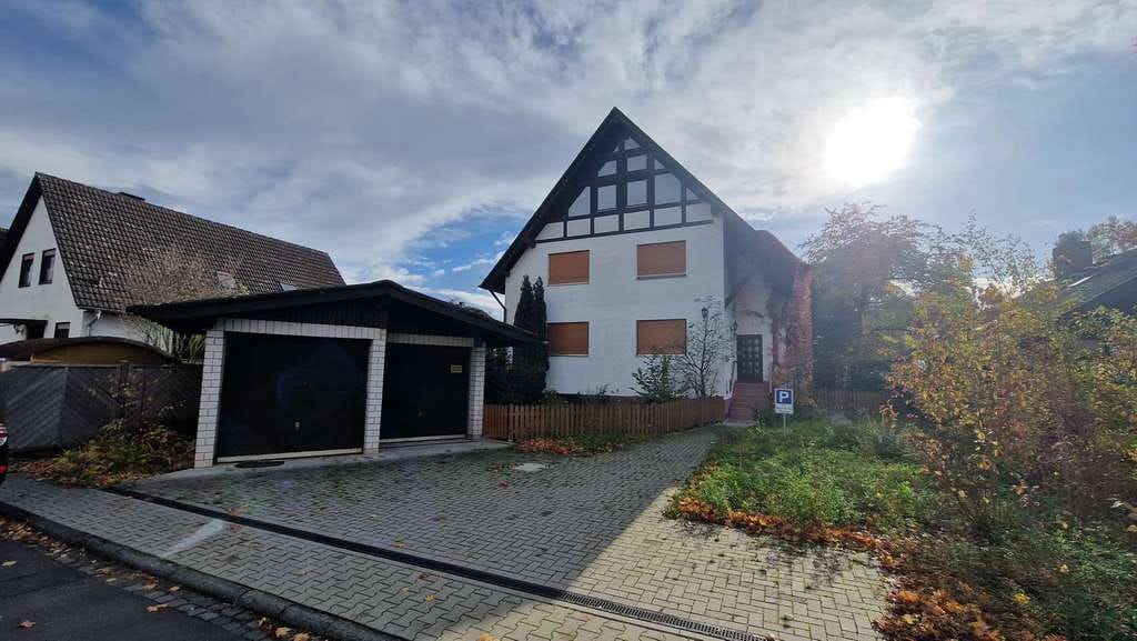 Immobilie in Großkrotzenburg - Zwei-Familienhaus mit Maisonette-Whg, Doppelgarage & Südgrundstück am Feld - Bild 1