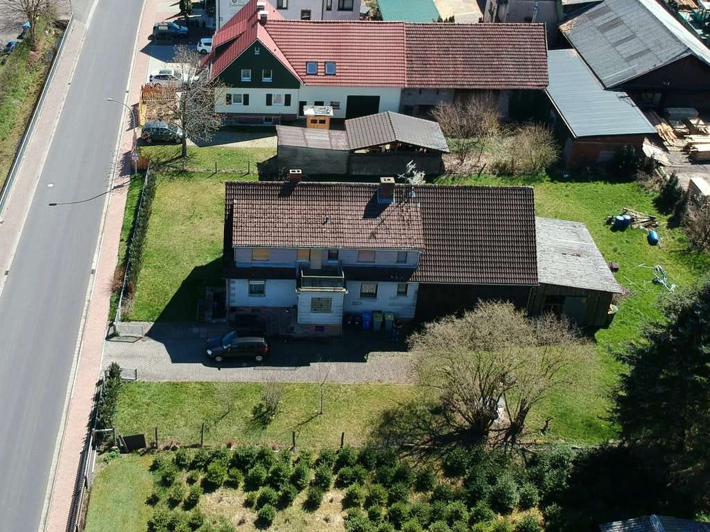 Immobilie in Jossgrund - Zweifamilienhaus mit großem Grundstück, Scheune & viel Potenzial - Bild 0