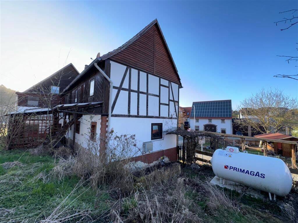 Immobilie in Wolfhagen - Einfamilienhaus plus möglichen Bauplatz in Wolfhagen-Viesebeck! - Bild 1