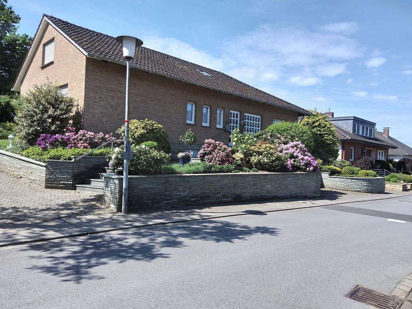 Immobilie in Bad Iburg - Winkelbungalow mit 3 Wohneinheiten & PV in ruhiger Lage von Bad Iburg - Bild 1