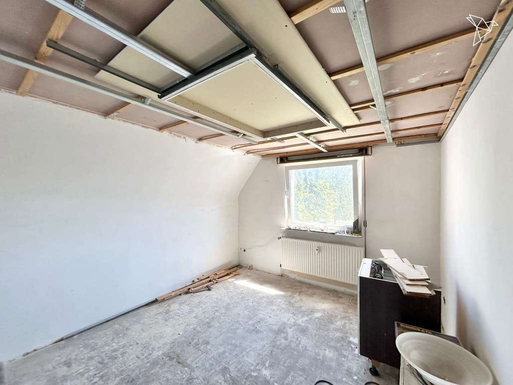 Immobilie in Raunheim - ENTWICKLUNGSPOTENTIAL 📈 Sanierungsbedürftiges Mehrfamilienhaus mit 790 m² Baugrundstück! - Bild 2