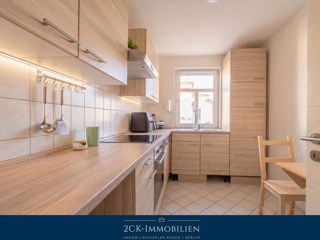 Immobilie in Göhren - Ostseebad Göhren: Vermietete 85 m² Wohnung, Balkon, EBK & Parkplätze – nur 700 m zum Strand! - Bild 2