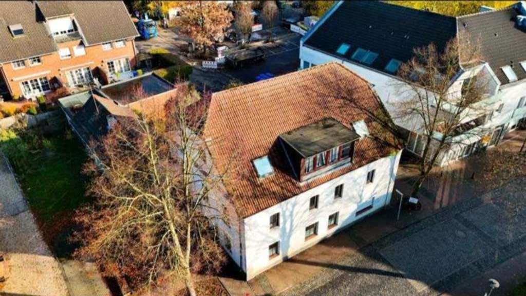 Immobilie in Schwalmtal - Raum für Ihre Zukunft – Großes Zweifamilienhaus mit vielseitigen Möglichkeiten - Bild 2