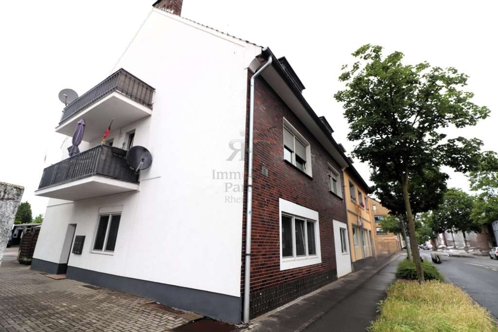 Immobilie in Dinslaken - Gepflegtes und gut vermietetes Mehrfamilienhaus mit Garagen und Carports in Dinslaken-Bruch! - Bild 2
