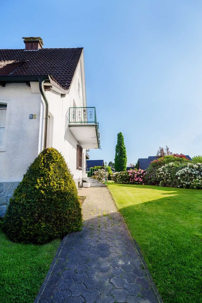 Immobilie in Nottuln - Attraktives Zweifamilienhaus in Nottuln – Viel Platz und ein schöner Garten - Bild 0