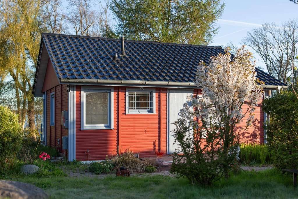 Immobilie in Bünsdorf - Holz-Ferienhaus am Wittensee – Naturnahes Wohnen in Bünsdorf - Bild 1