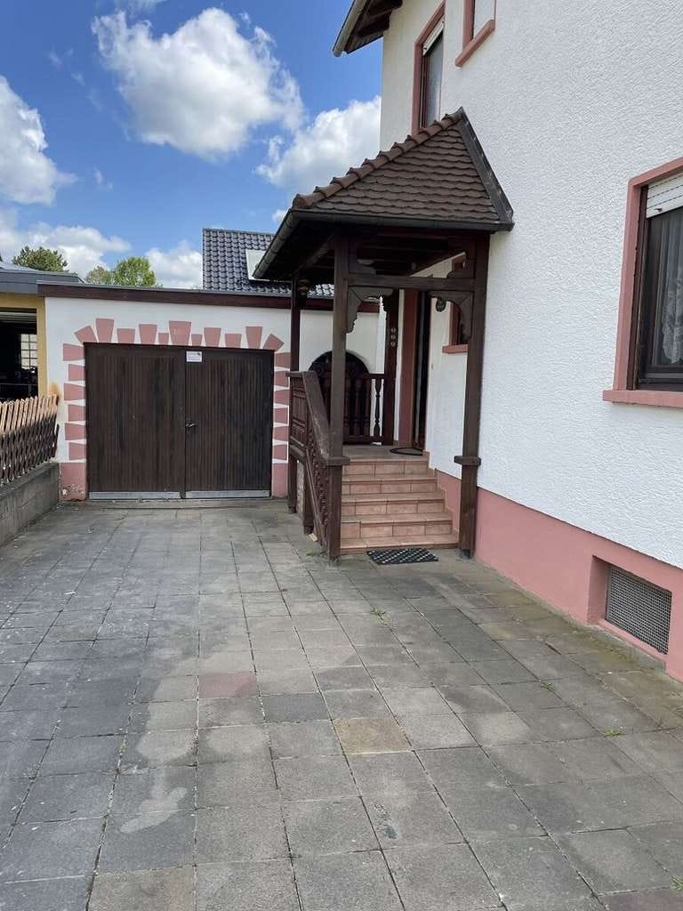 Immobilie in Gau-Odernheim - ImmobilienPunkt*** Freistehendes EFH mit Werkstatt und Garten in ruhiger Wohnlage - Bild 2