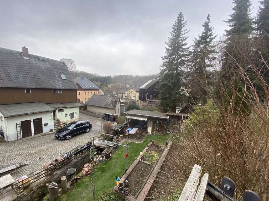 Immobilie in Grünhainichen - Einfamilienhaus mit Doppelgarage und schönem Garten - Bild 3