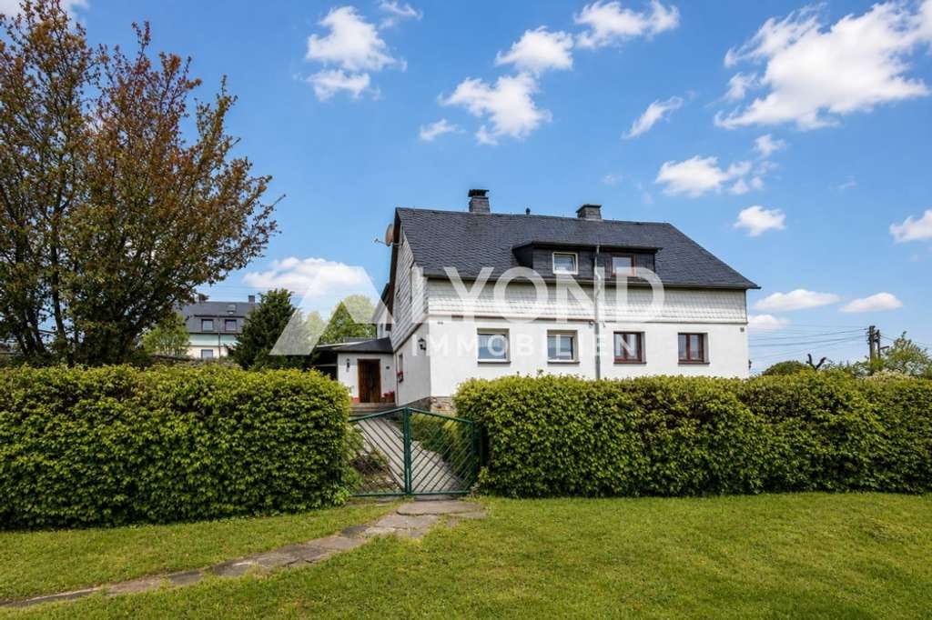 Immobilie in Großhartmannsdorf - Gepflegte Doppelhaushälfte mit großem Garten, Nebengelass & vielseitigen Außenbereichen - Bild 0