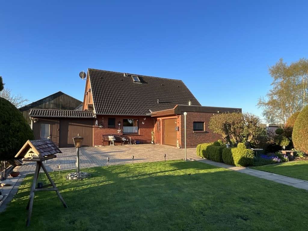 Immobilie in Stadland - Liebevoll gepflegtes Einfamilienhaus im Aussenbereich der Gem. Stadland - Bild 2