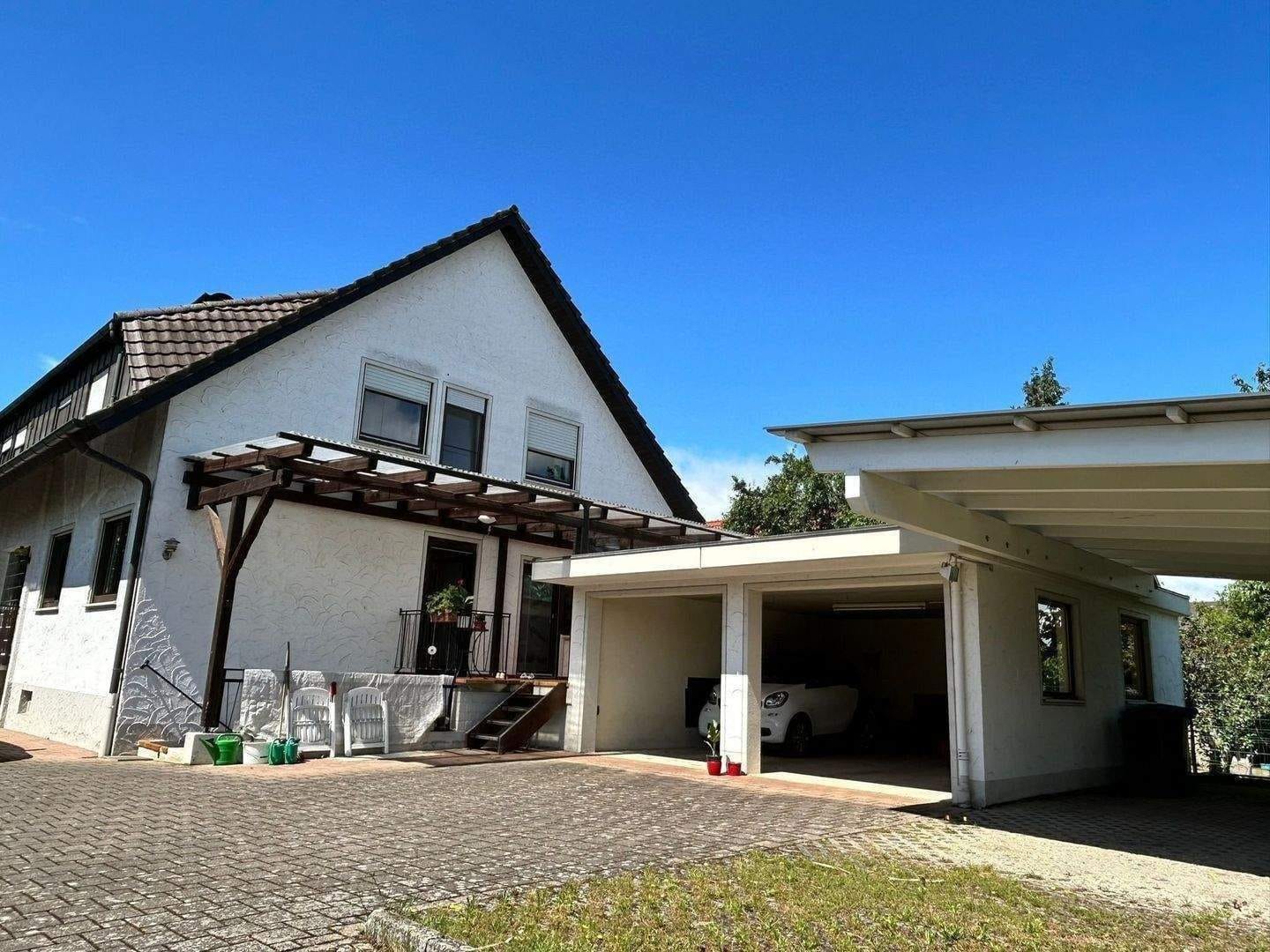 Immobilie in Wyhl - Wohnen mit Weitblick – Zweifamilienhaus auf großzügigem Grundstück - Bild 1