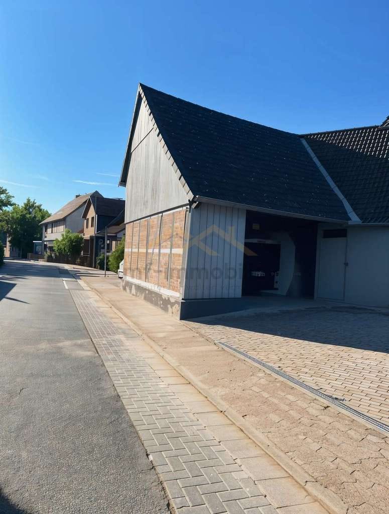 Immobilie in Lehre - Mehrfamilenhaus mit 5 Wohnungen, mit Potenzial zur Aufteilung - Bild 2