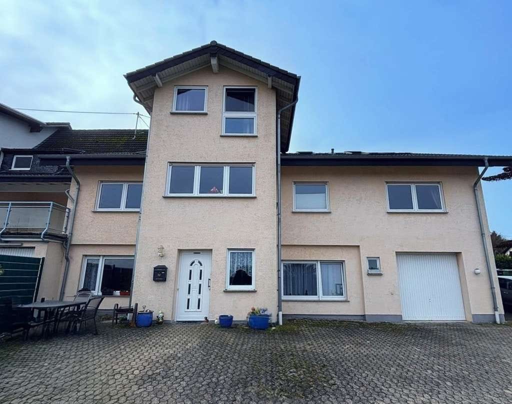 Immobilie in Neustadt (Wied) - Geräumiges und gepflegtes Mehrfamilienhaus in Neustadt (Wied) - Bild 1