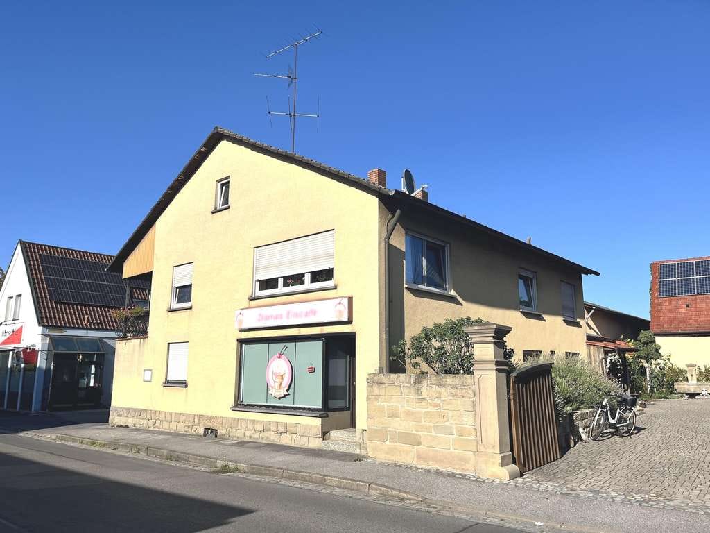 Immobilie in Sand a.Main - Mitten im Dorf - mitten im Leben! Komplett vermietetes Wohn- u. Geschäftshaus mit Werkstatt/Garage, - Bild 0