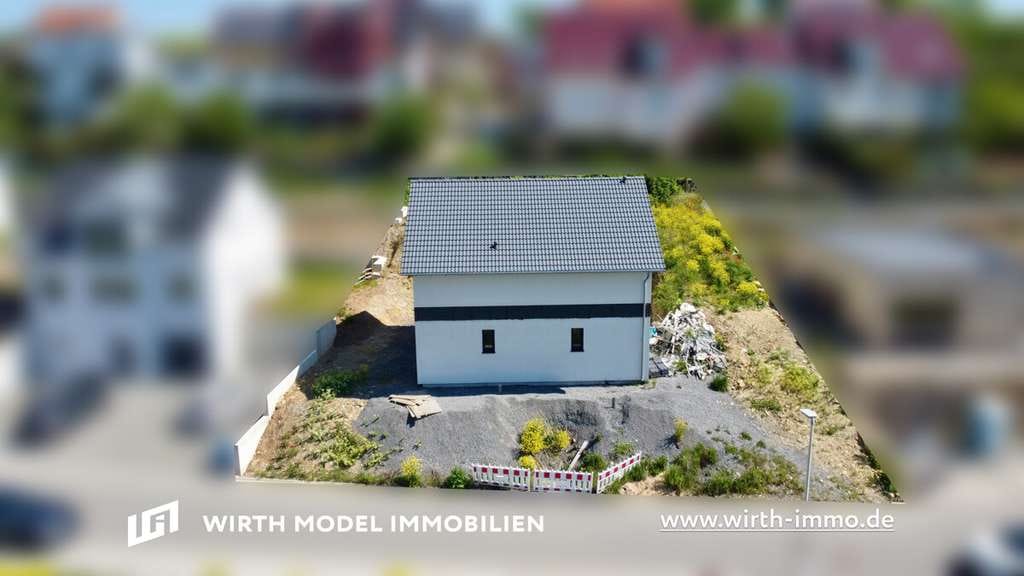 Immobilie in Maßbach - Freistehendes Einfamilienhaus zur individuellen Fertigstellung mit Grundstück in Hanglage - Bild 2