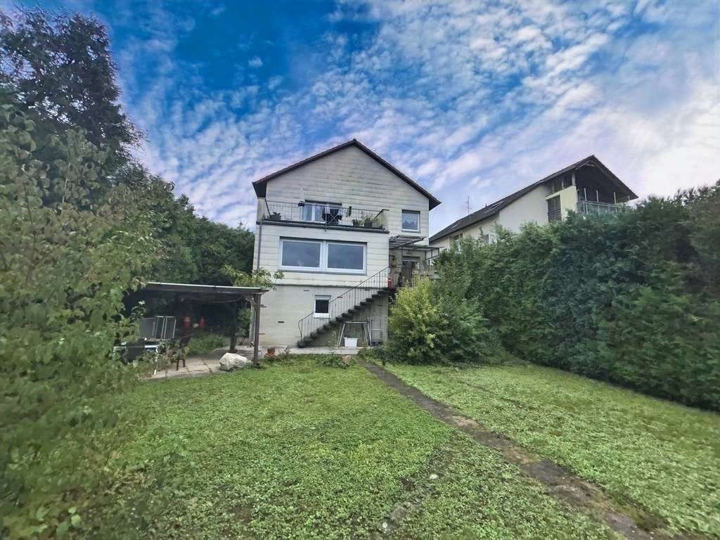 Immobilie in Oftersheim - Vermietetes Zweifamilienhaus mit großem Garten - Bild 2