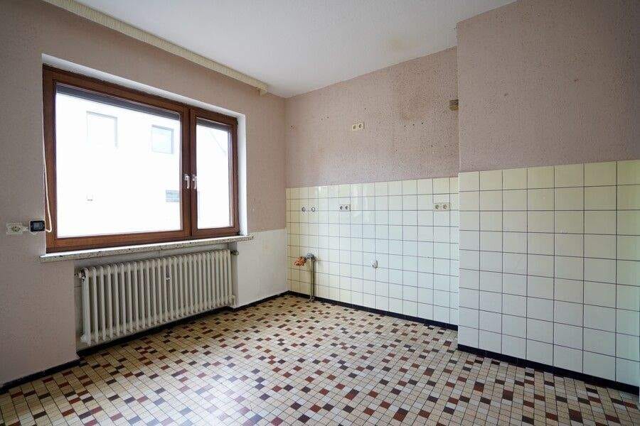 Immobilie in Scheeßel - Einfamilienhaus in ruhiger Lage mit Vollkeller, Garage und Gartenidylle - Bild 1