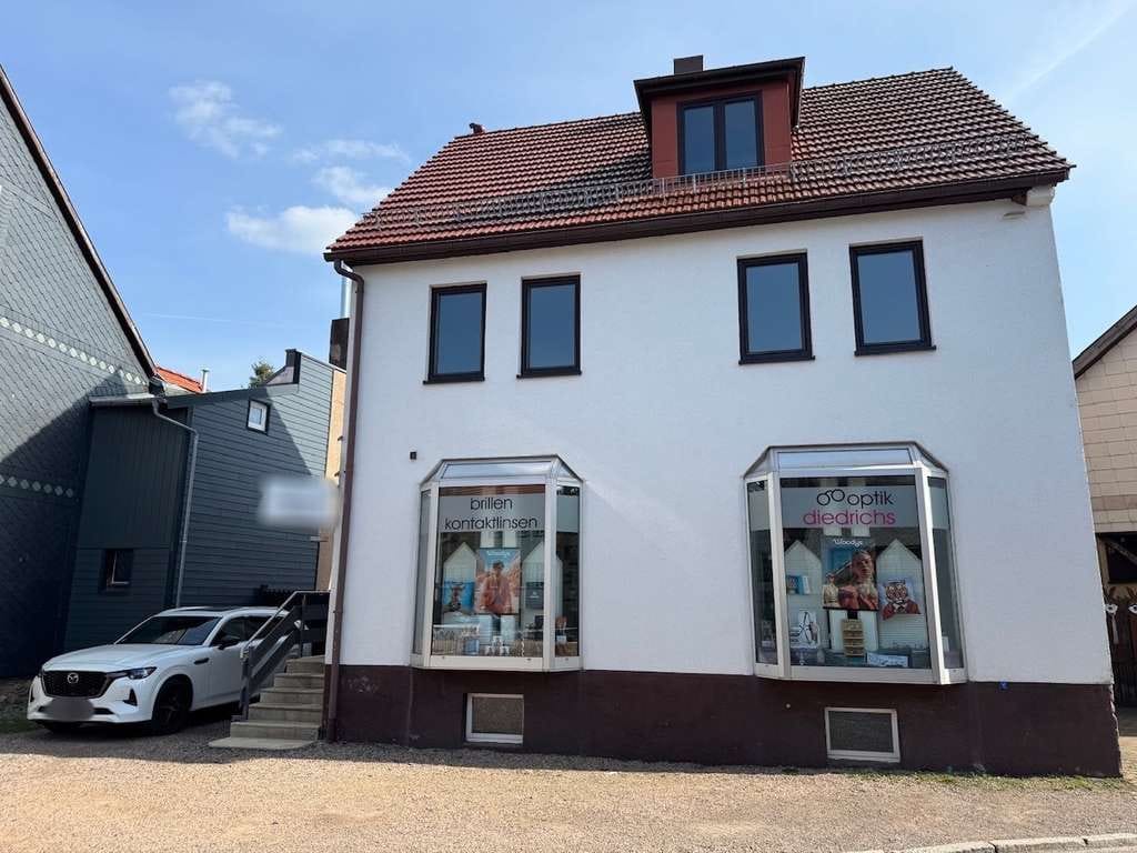 Immobilie in Bad Tabarz - Freistehendes Einfamilienhaus mit vermieteter Ladeneinheit in zentraler Lag - Bild 1