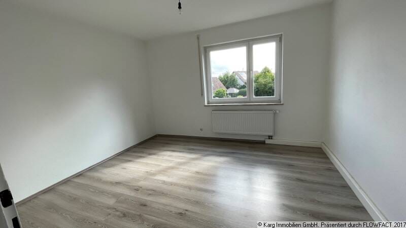 Immobilie in Zimmern ob Rottweil - Sonniges Grundsück/tolle Wohnlage/3 Wohnungen - Bild 1