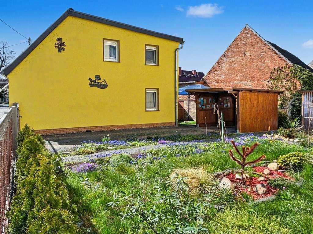 Immobilie in Belgern-Schildau - Klein aber fein: bezugsfreies Einfamilienhaus mit Innenhof, Nebengebäude und Garten in Belgern - Bild 2