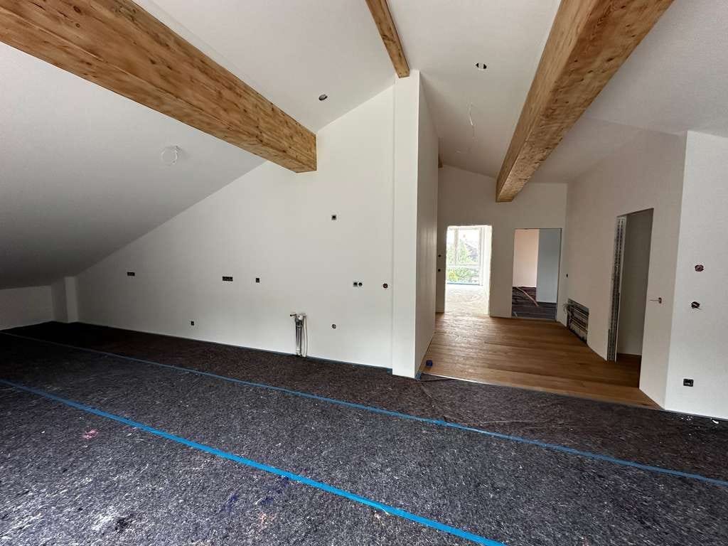 Immobilie in Eppertshausen - Riesige Neubau-Dachgeschosswohnung mit Masterbereich, Ankleidezimmer und Blick ins Grüne! - Bild 1