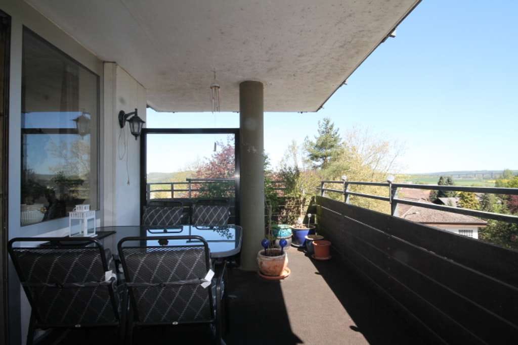 Immobilie in Buseck - 2-Zimmer-Wohnung mit Weitblick - 81 m² - großer Balkon - inkl. moderner EBK - ideal für Pendler - Bild 1