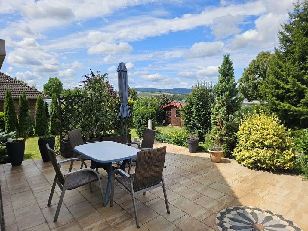 Immobilie in Hülsede - Charmantes Einfamilienhaus mit traumhaftem Garten und herrlichem Ausblick - Bild 3