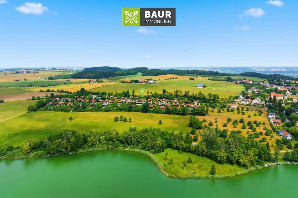 Immobilie in Illmensee - Sofort frei! Großzügiges Einfamilienhaus mit Garten und Seeblick am Ruschweiler See - Bild 1